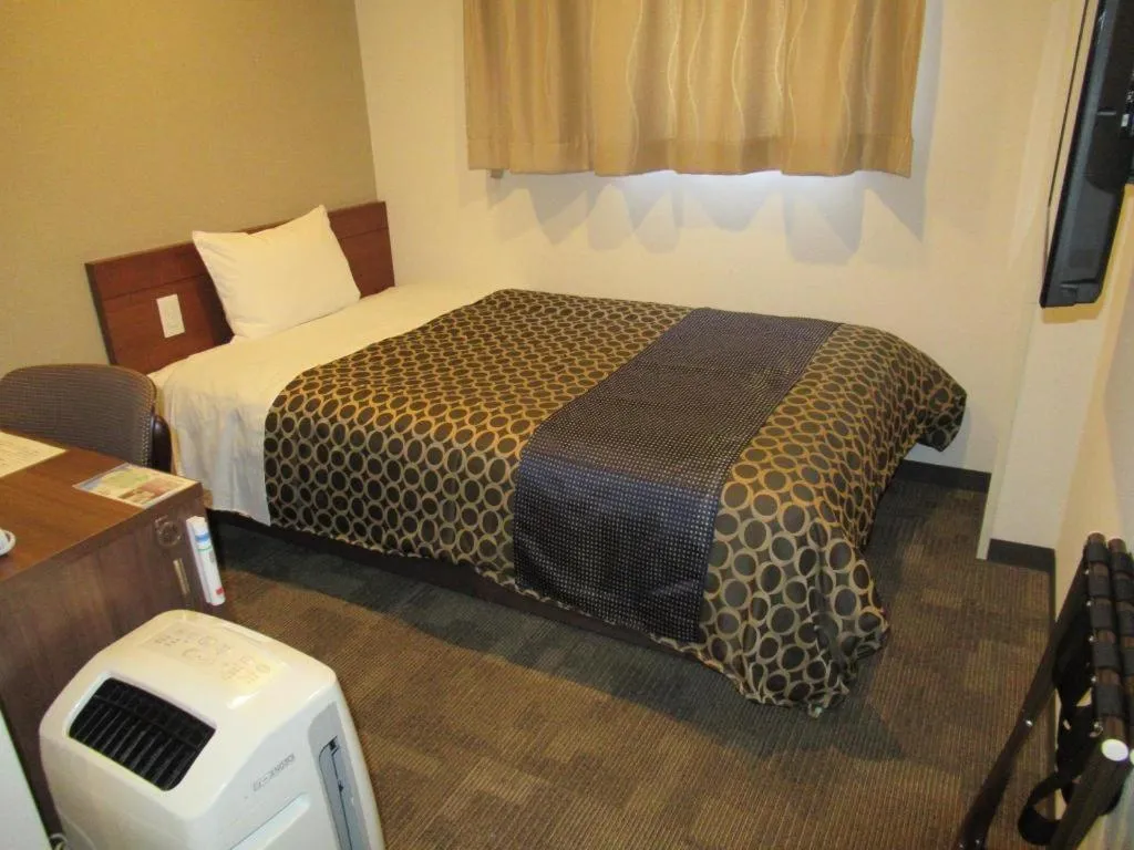 Bed in Utsunomiya Higashi Hotel