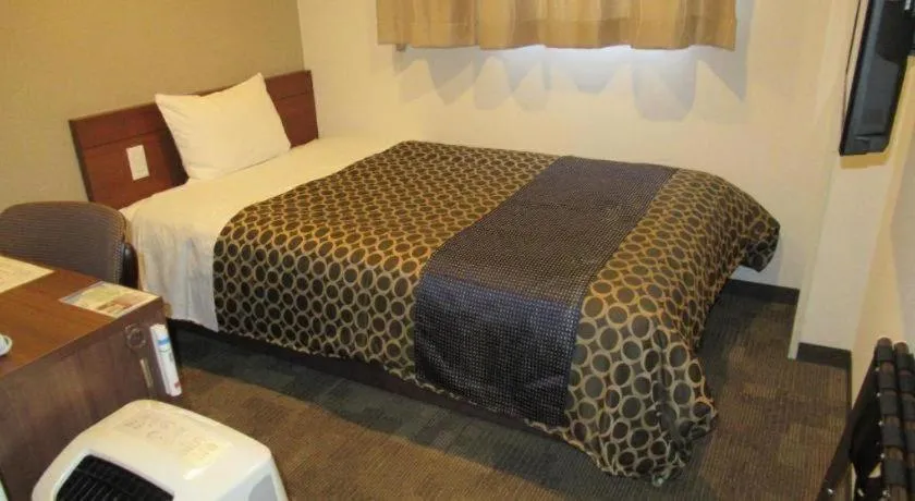 Bed in Utsunomiya Higashi Hotel