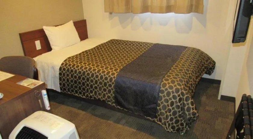 Bed in Utsunomiya Higashi Hotel