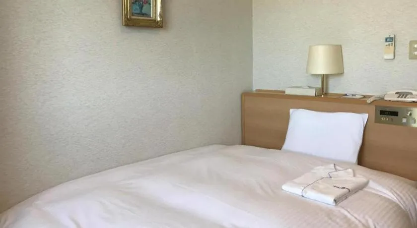 Bed in Mutsu Park Hotel