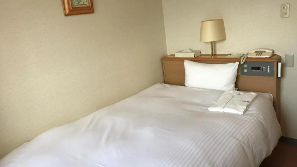Bed in Mutsu Park Hotel
