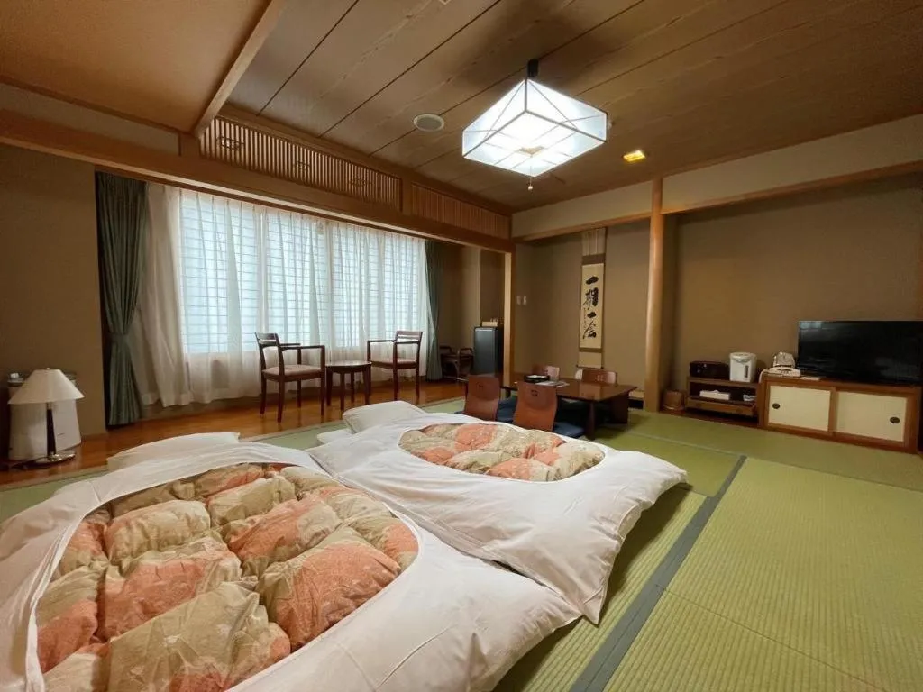 Bed in Mutsu Park Hotel