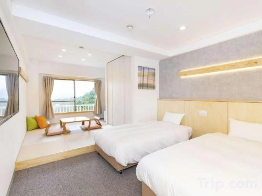 Bed in Muika Onsen Hotel