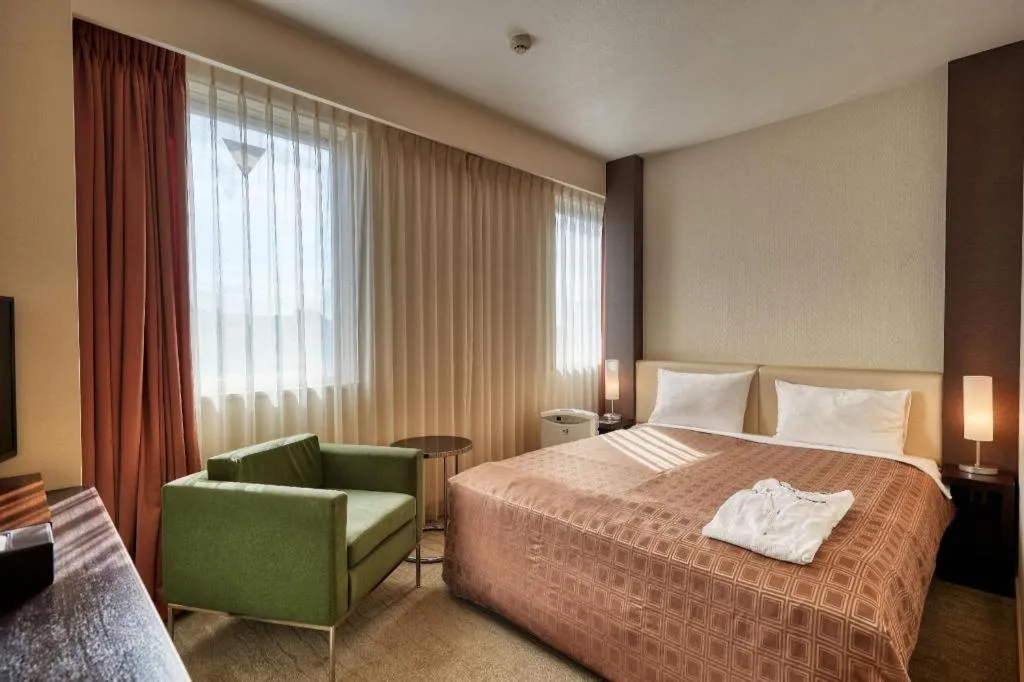 Bed in Hotel Yuquesta Asahibashi