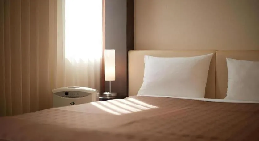 Bed in Hotel Yuquesta Asahibashi