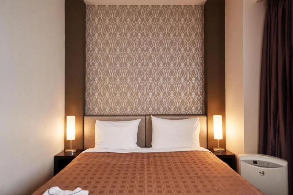 Bed in Hotel Yuquesta Asahibashi