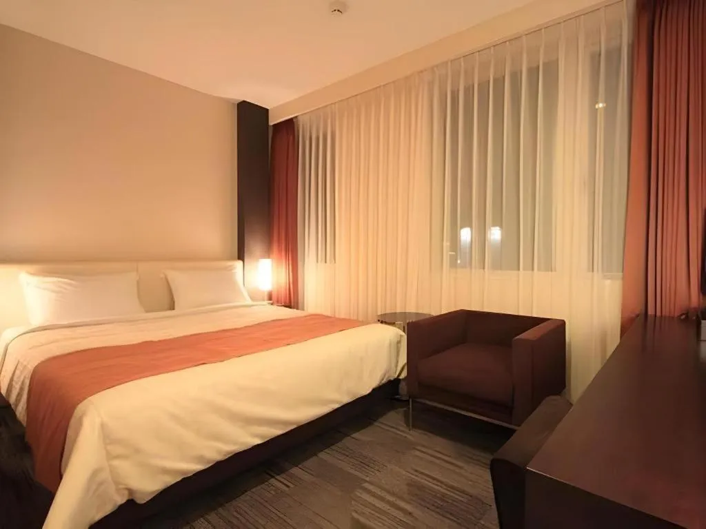 Bed in Hotel Yuquesta Asahibashi