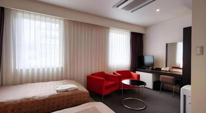 Bed in Hotel Yuquesta Asahibashi