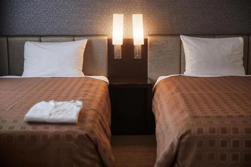 Bed in Hotel Yuquesta Asahibashi