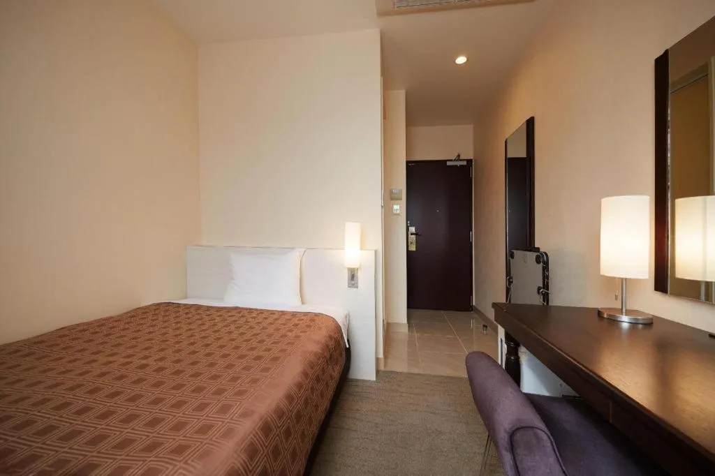 Bed in Hotel Yuquesta Asahibashi