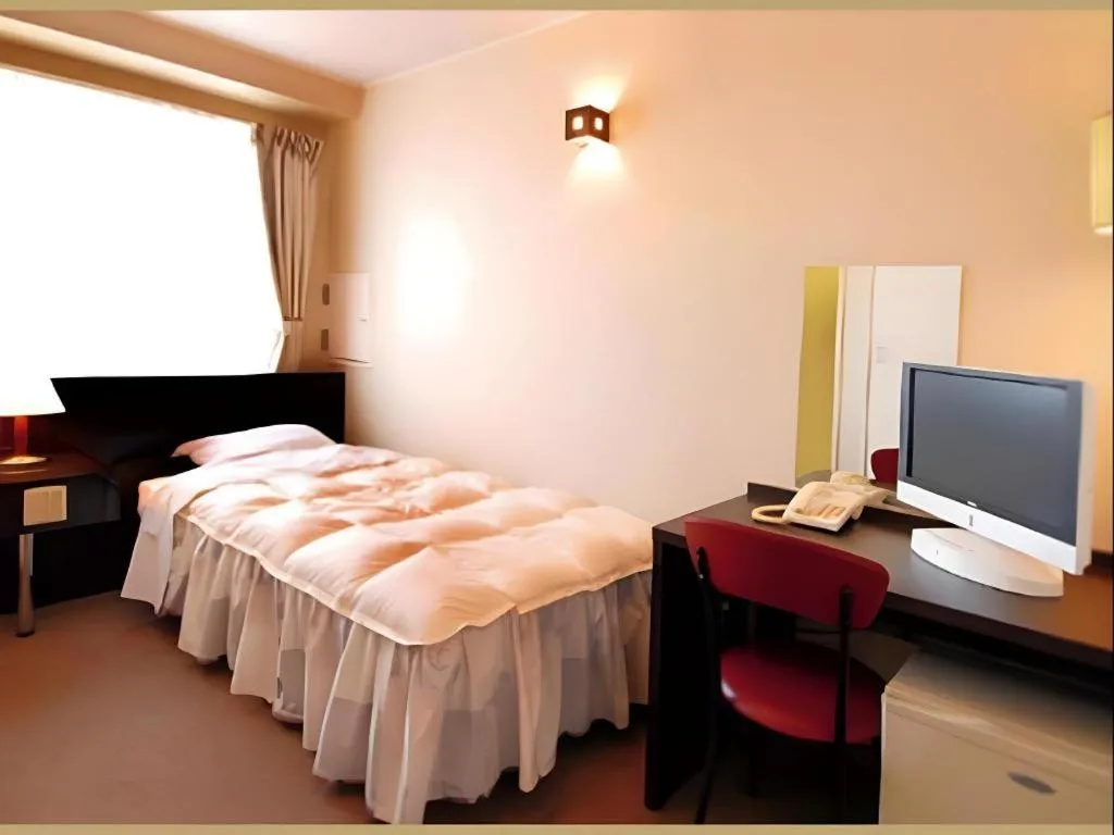 Bed in Hotel The Grand Court Matsusaka