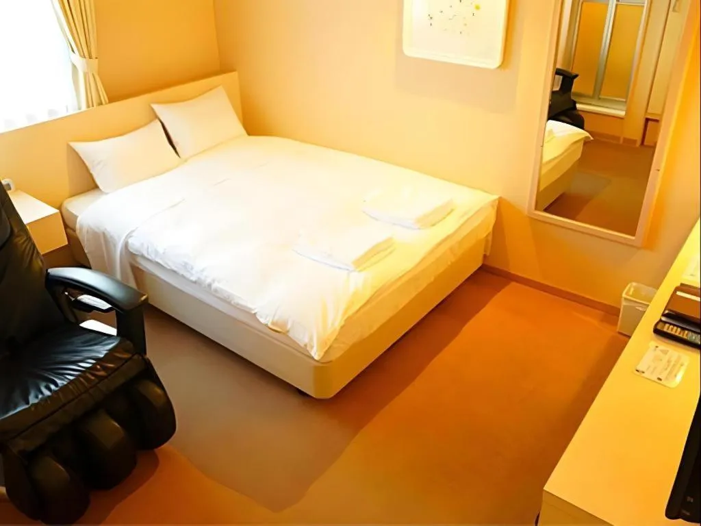 Bed in Hotel The Grand Court Matsusaka