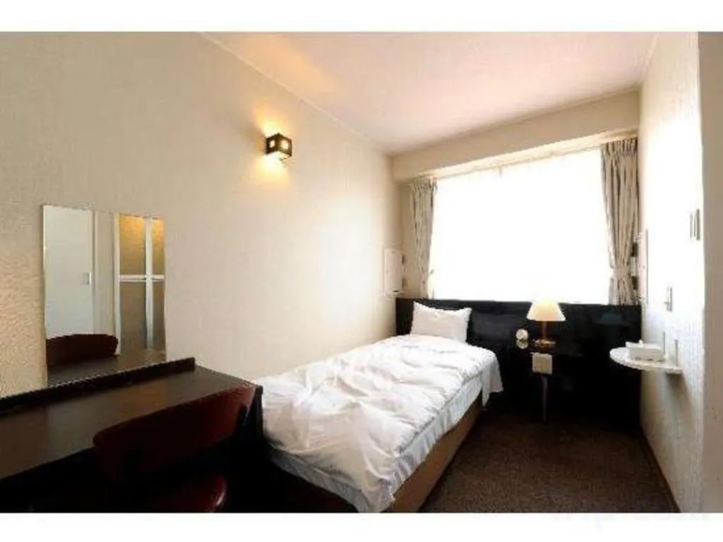 Bed in Hotel The Grand Court Matsusaka