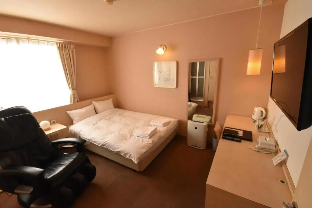 Bed in Hotel The Grand Court Matsusaka