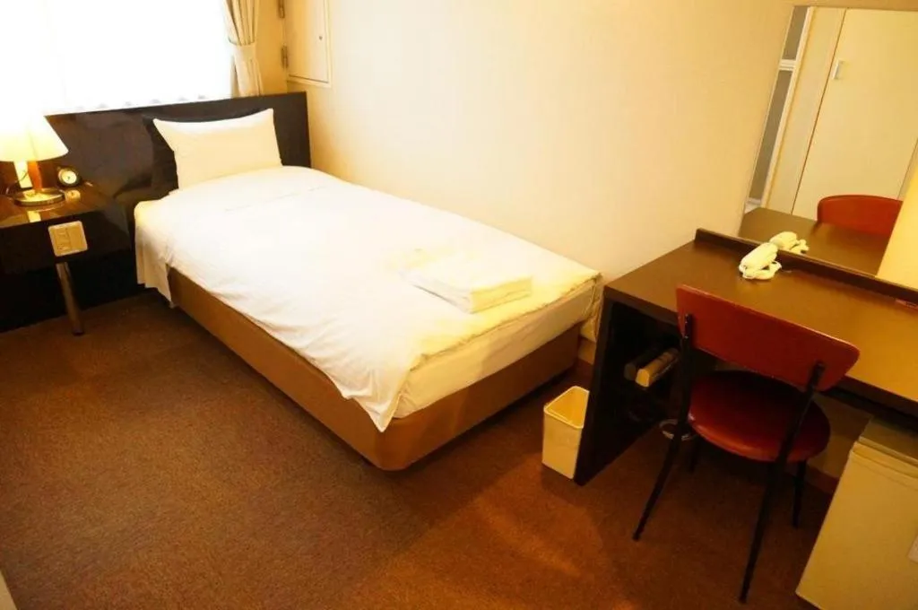 Bed in Hotel The Grand Court Matsusaka