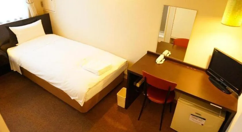 Bed in Hotel The Grand Court Matsusaka