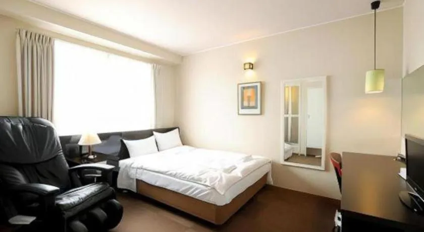 Bed in Hotel The Grand Court Matsusaka