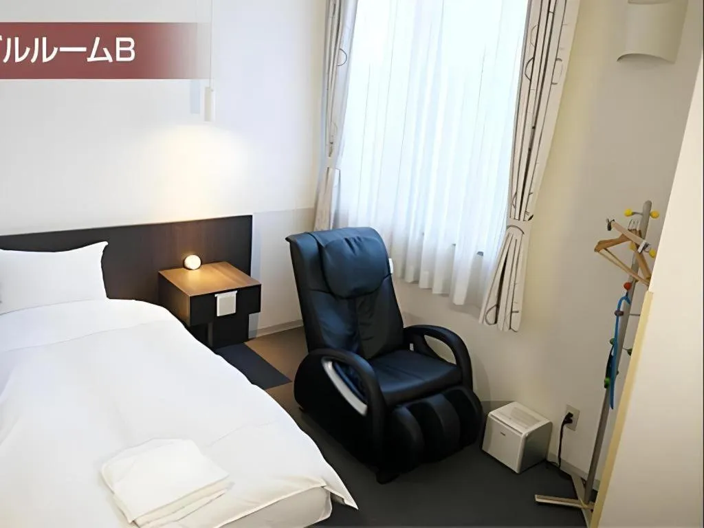 Bed in Hotel The Grand Court Matsusaka