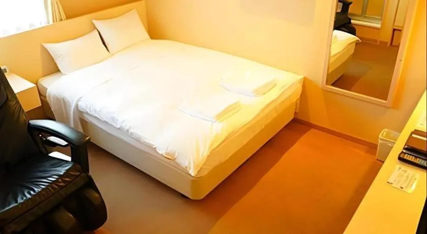 Bed in Hotel The Grand Court Matsusaka