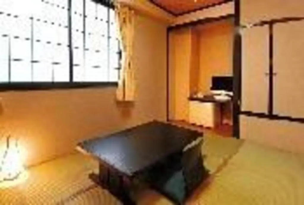 Bed in Hotel The Grand Court Matsusaka