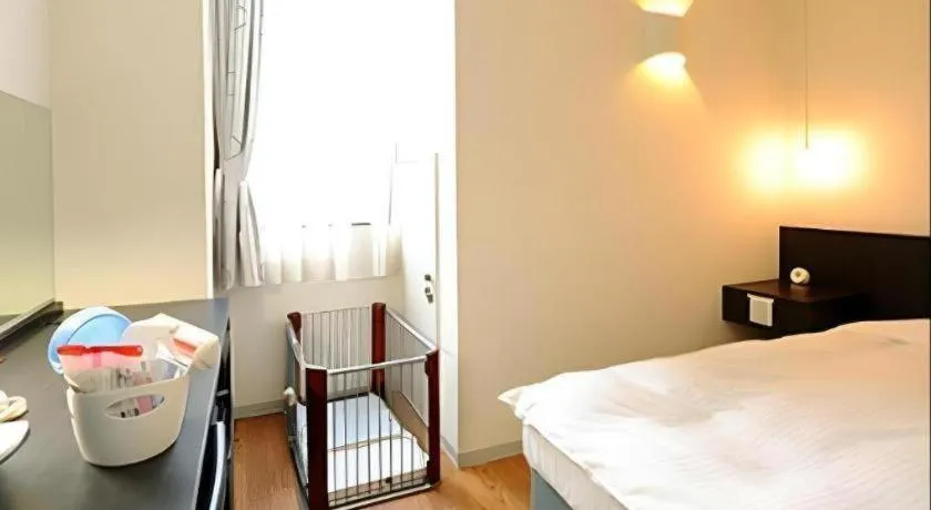 Bed in Hotel The Grand Court Matsusaka