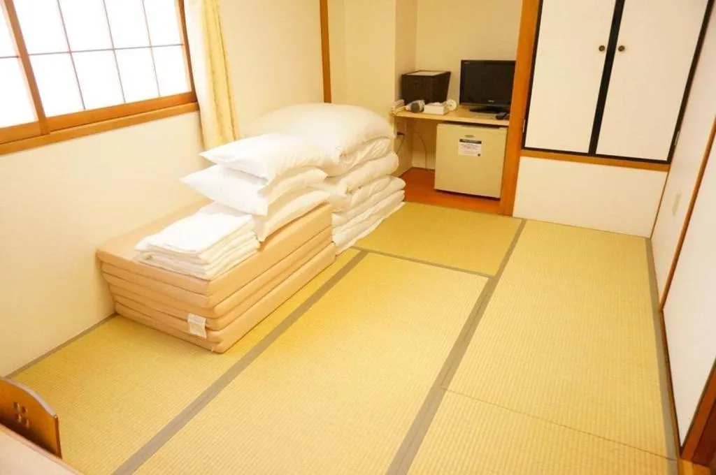 Bed in Hotel The Grand Court Matsusaka