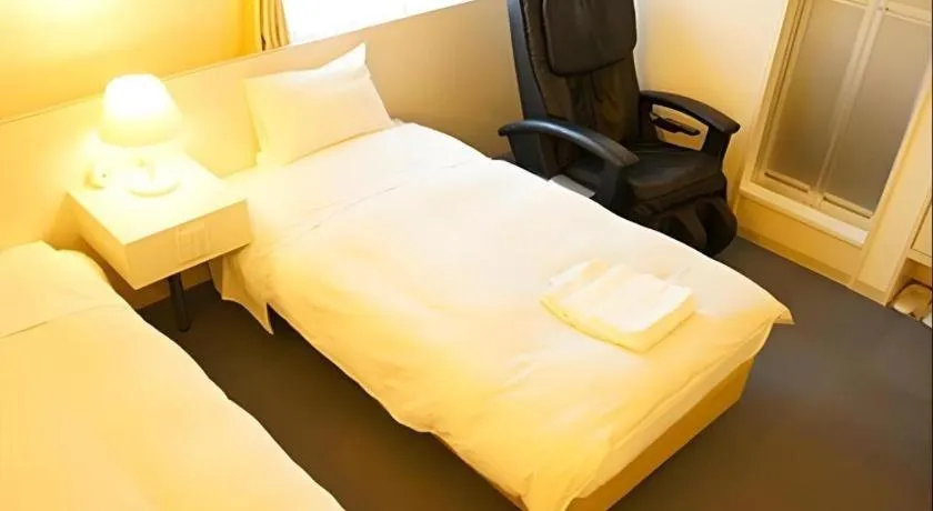 Bed in Hotel The Grand Court Matsusaka