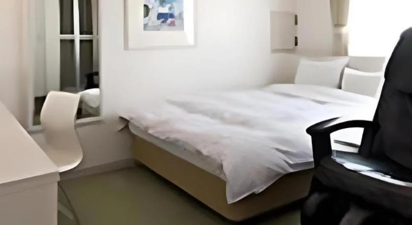 Bed in Hotel The Grand Court Matsusaka