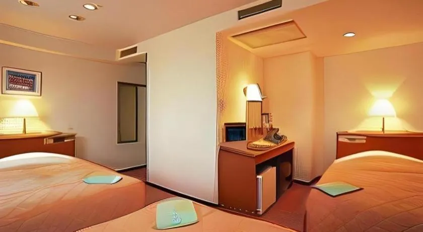 Bed in Mizue Dai-ichi Hotel