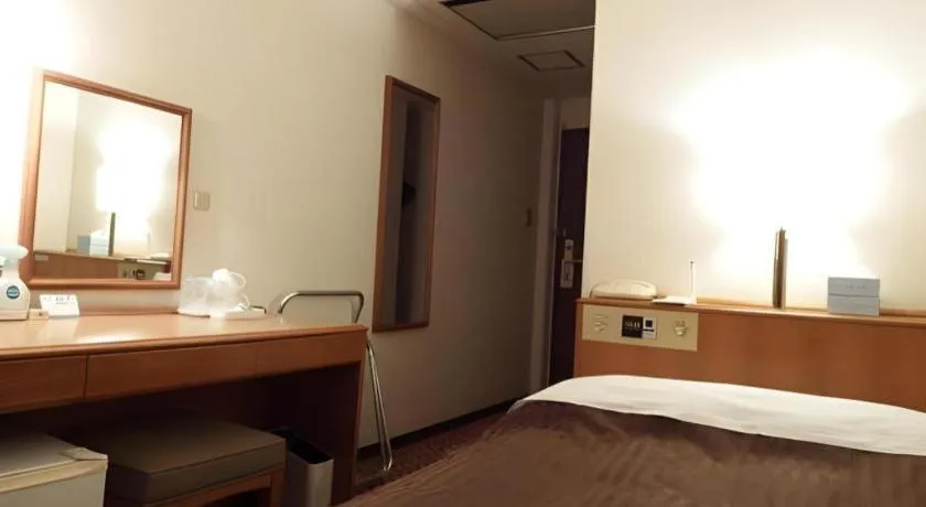 Bed in Mizue Dai-ichi Hotel