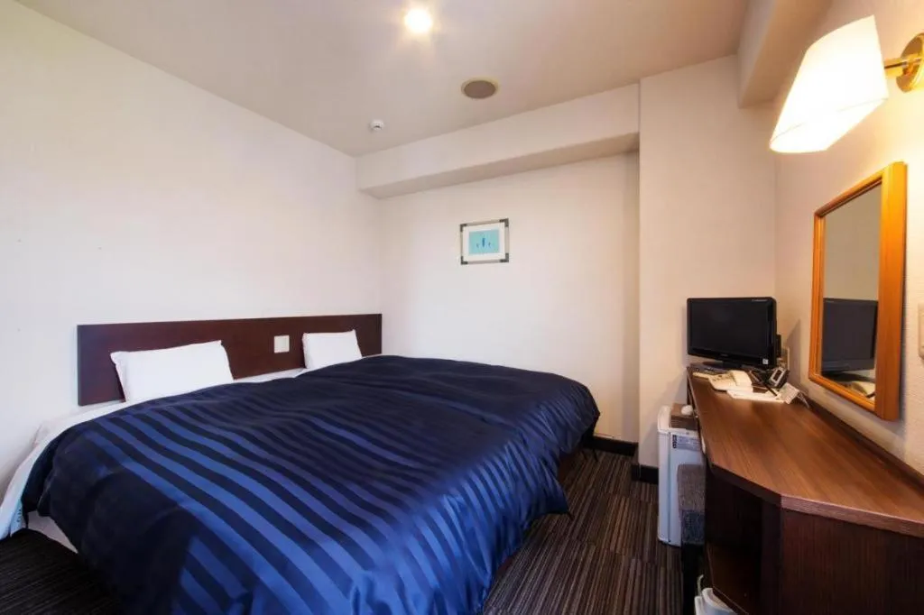 Bed in Kyoto Plaza Hotel Annex