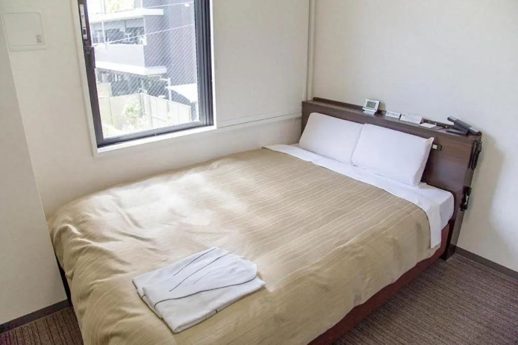 Bed in Kyoto Plaza Hotel Annex