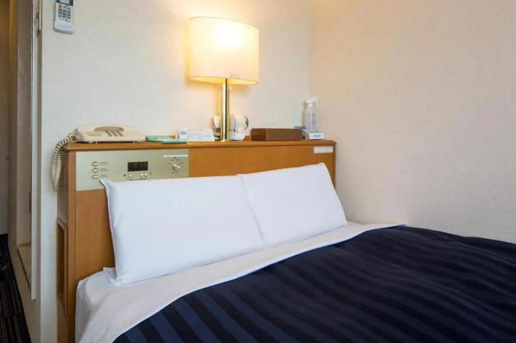 Bed in Kyoto Plaza Hotel Annex