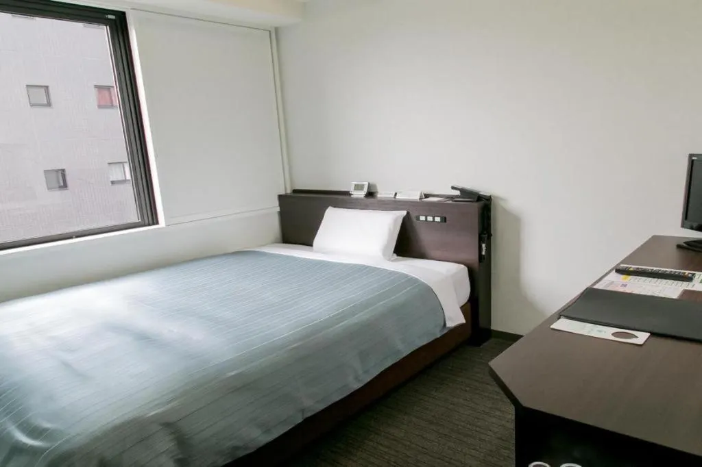 Bed in Kyoto Plaza Hotel Annex