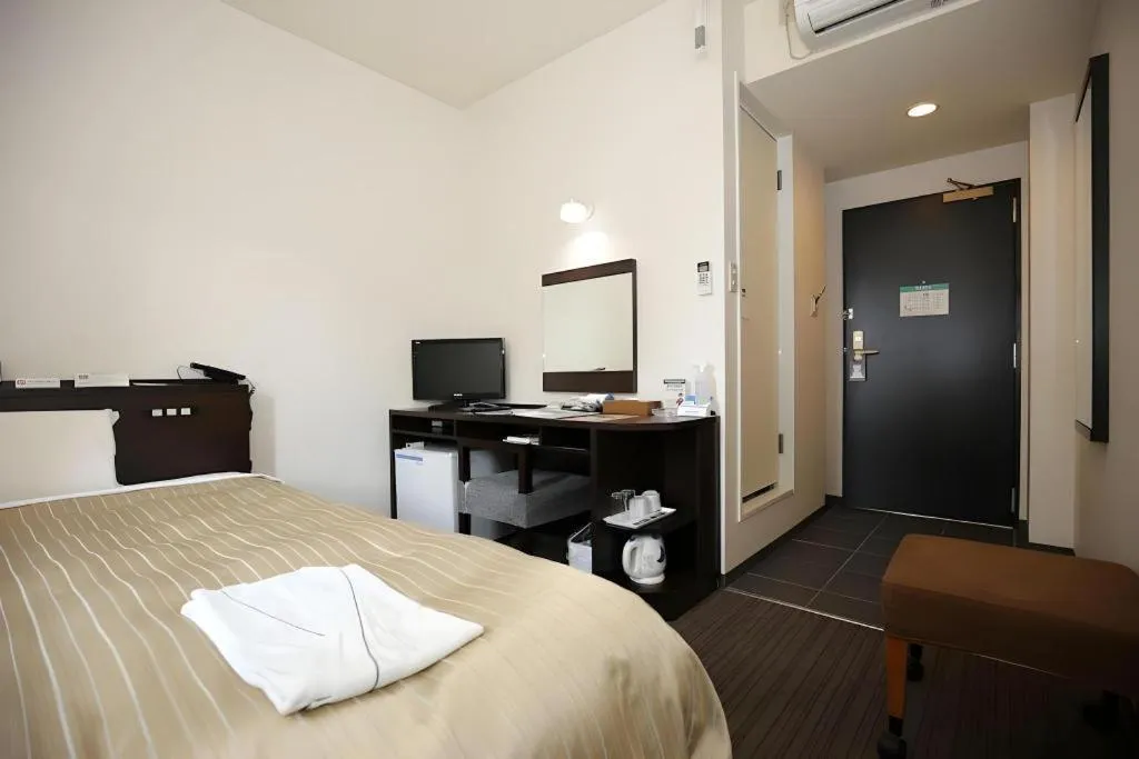 Bed in Kyoto Plaza Hotel Annex