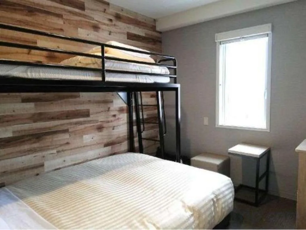 Bed in Super Hotel Hakodate