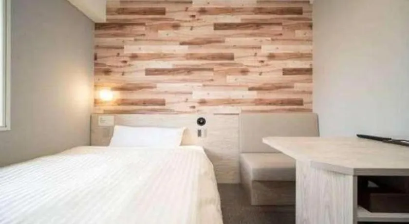 Bed in Super Hotel Hakodate