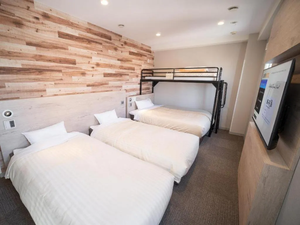 Bed in Super Hotel Hakodate
