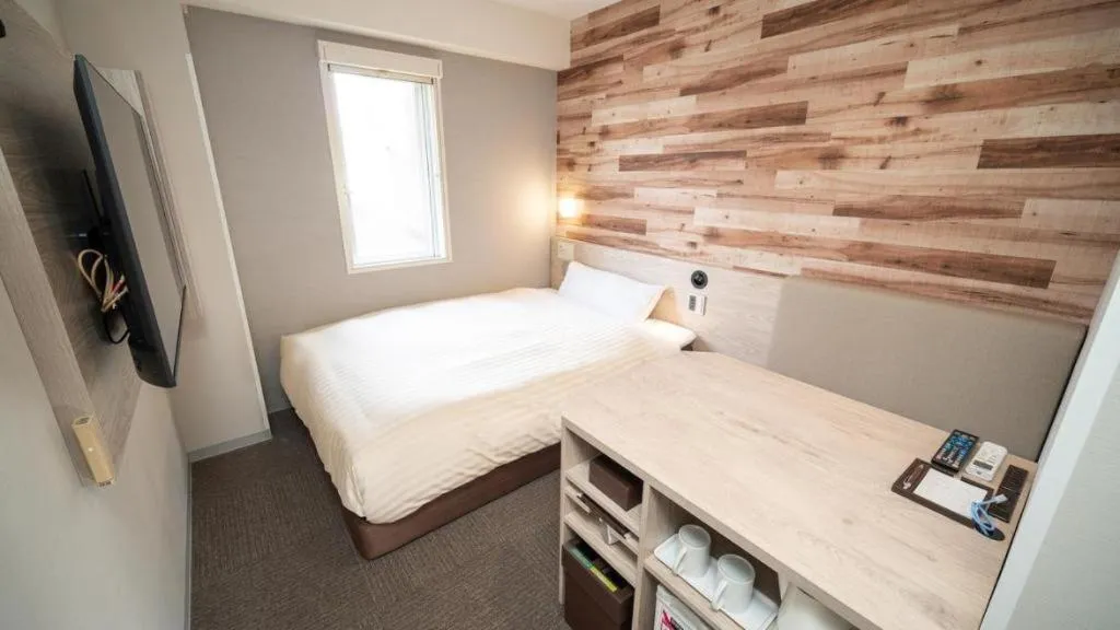 Bed in Super Hotel Hakodate