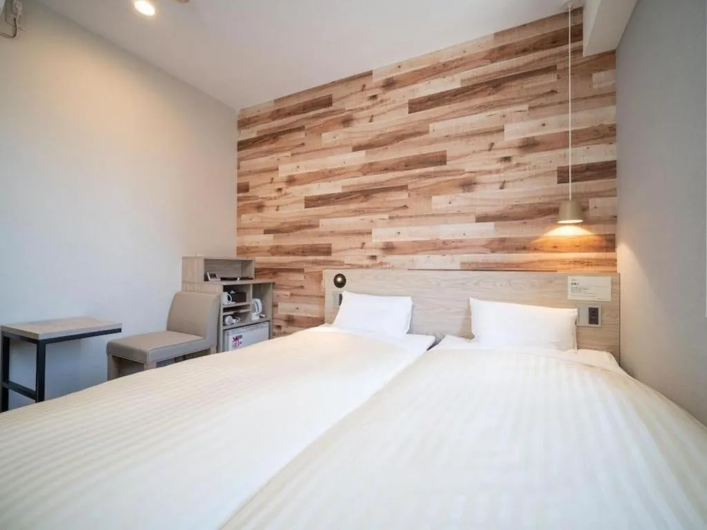 Bed in Super Hotel Hakodate