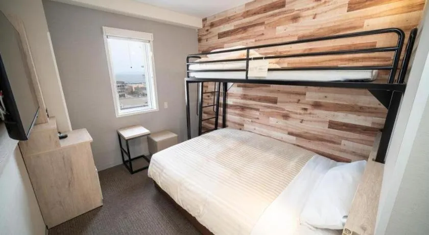 Bed in Super Hotel Hakodate