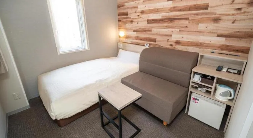 Bed in Super Hotel Hakodate