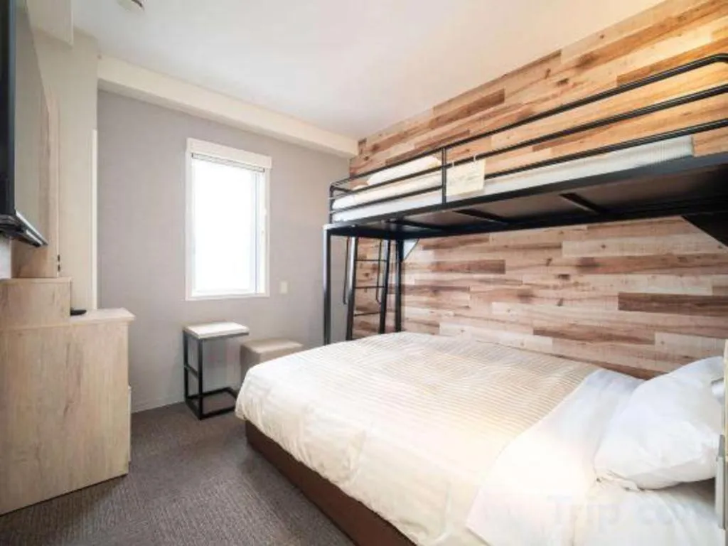 Bed in Super Hotel Hakodate