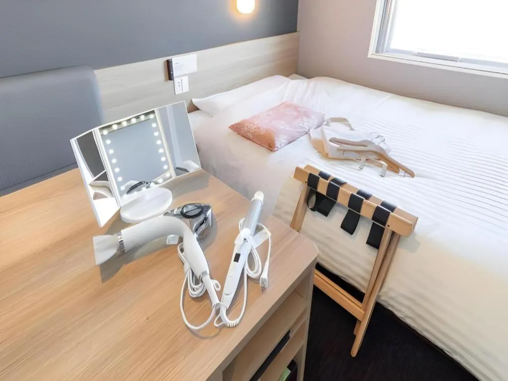 Bed in Super Hotel Hakodate