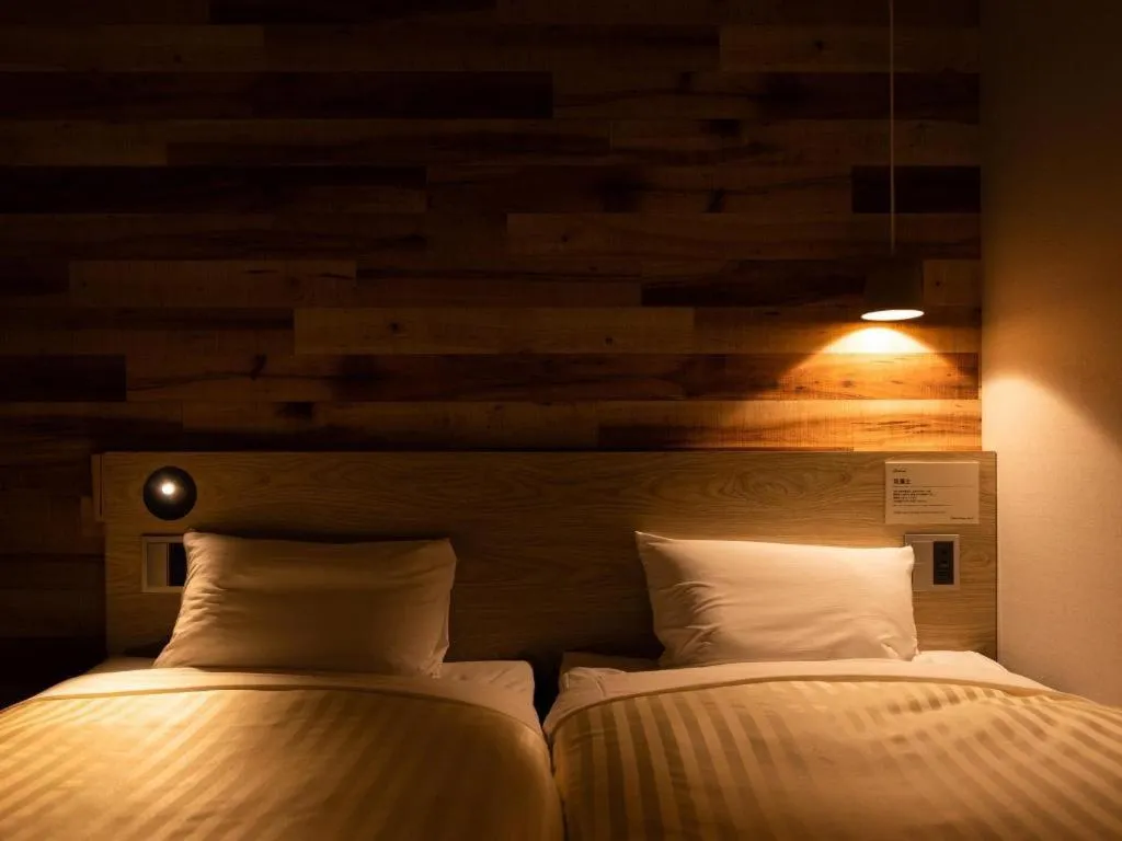 Bed in Super Hotel Hakodate