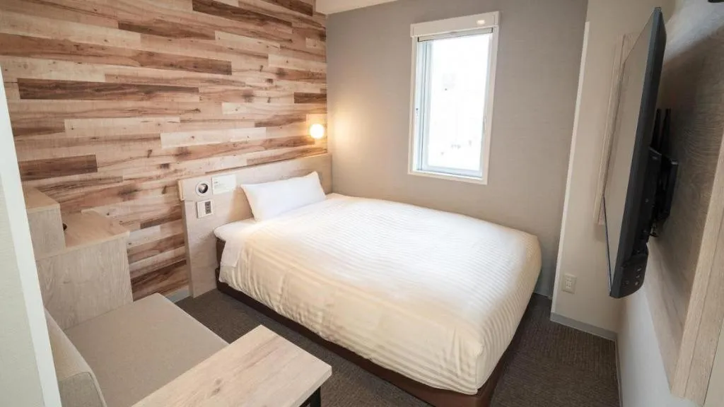 Bed in Super Hotel Hakodate