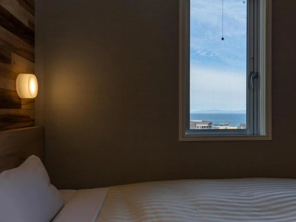 Bed in Super Hotel Hakodate