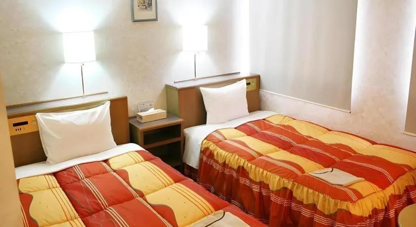 Bed in Shizuoka Daiichi Hotel