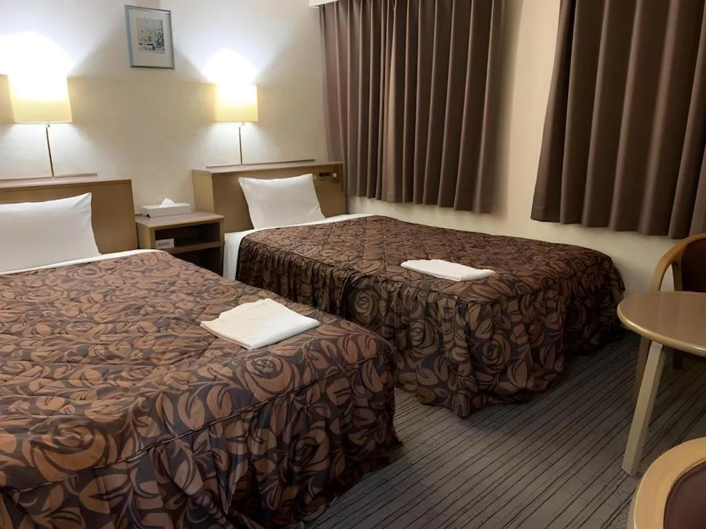 Bed in Shizuoka Daiichi Hotel