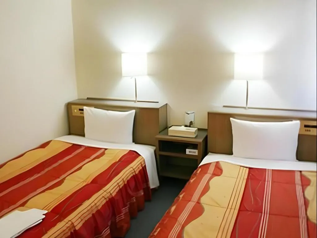 Bed in Shizuoka Daiichi Hotel